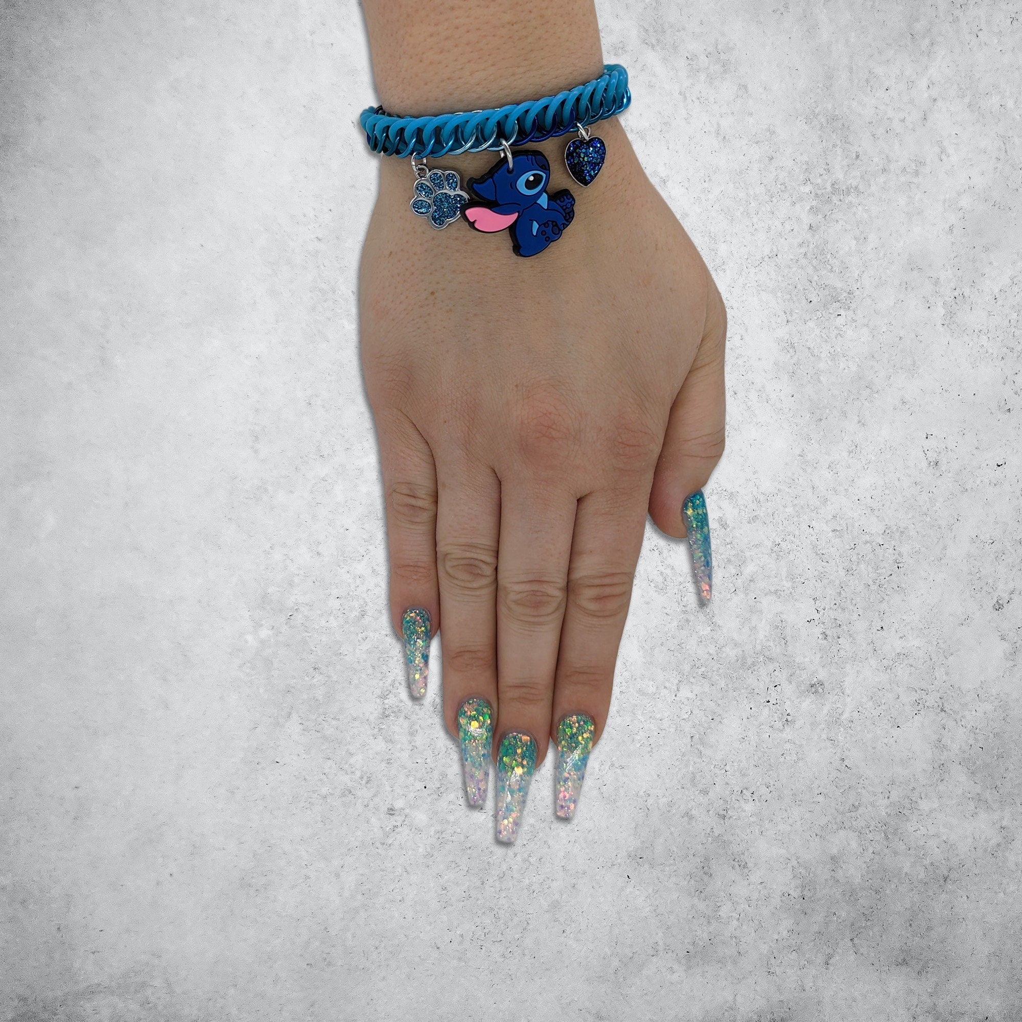 Blue Alien Charm Bracelet Girl hand wearing