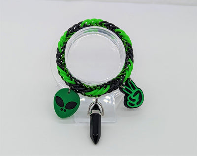 Black & Green Alien Charm Bracelet Place In Stand Front View