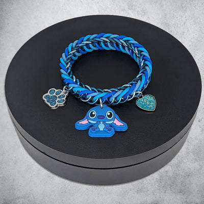 Blue Alien Charm Bracelet Place in Black Revolving Stand